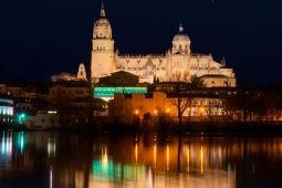Lunar eclipse in the dock area of Salamanca with the cathedral illuminating the River Tormes. Castilla y León