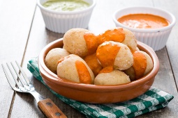 Potatoes with mojo sauce, typical of Canarian cuisine Potatoes with mojo sauce, typical of Canarian cuisine