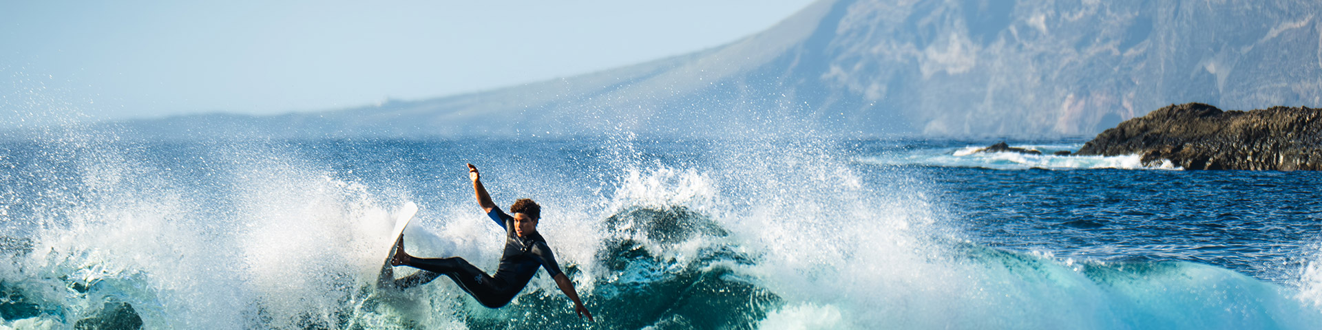 The island of Tenerife offers over 20 spots for practicing surfing