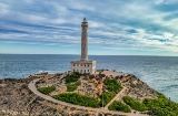 Panoramic view of the famous Mermaid Reef with Cabo de Gata Lighthouse (Almeria, Spain) in the background