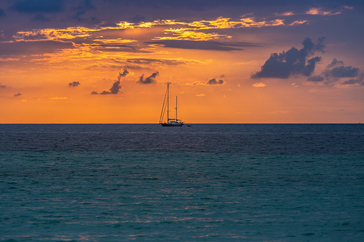 Es Trenc beach (Mallorca, Balearic Islands), one of the top spots to watch the sunset from a boat Es Trenc beach (Mallorca, Balearic Islands), one of the top spots to watch the sunset from a boat
