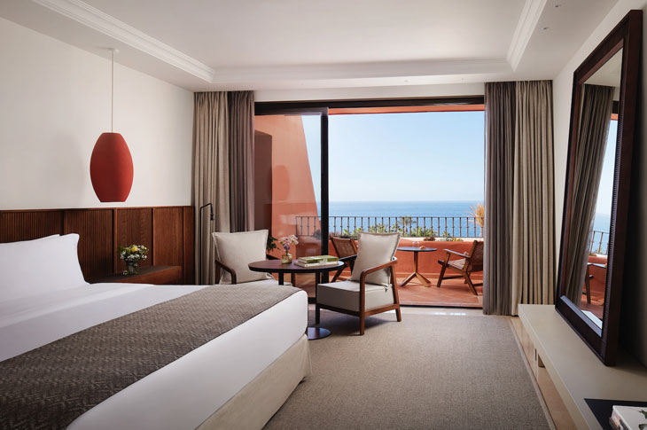 The suites at Tivoli La Caleta present a sleek, minimalist design with understated decor and stunning ocean views