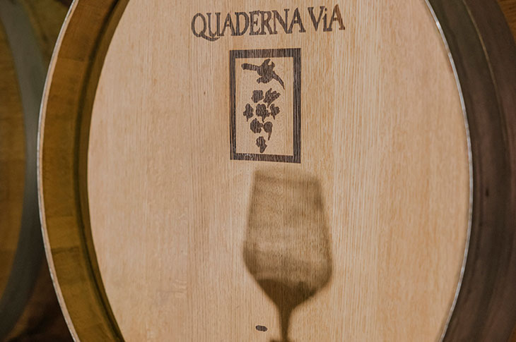Barrels at the Quaderna Vía Winery. Its vineyard interacts with the environment to promote biodiversity, connecting native plants and local fauna with the vines