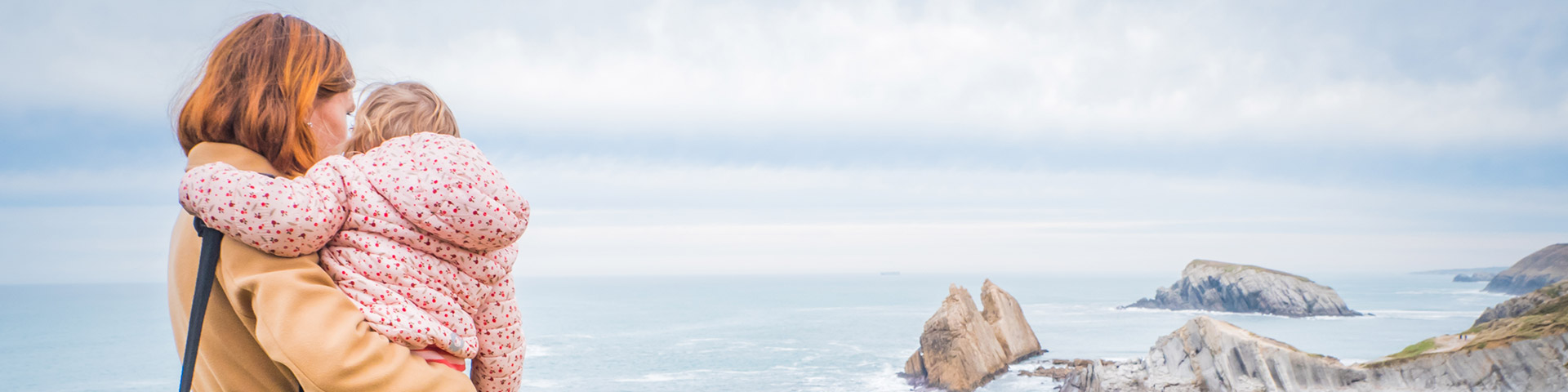 Cantabria is home to some of the most spectacular natural paradises in Spain. In the image, a family visit the Portio cliff in Liencres