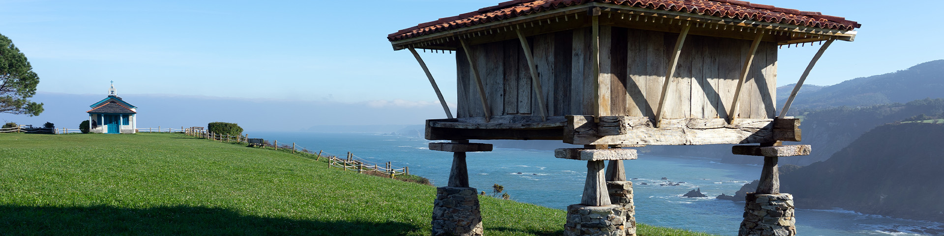 The hórreo is a traditional wooden construction typical of northern Spain, functioning as an elevated storehouse to protect crops and food. Pictured: hórreo in Cadavedo, a parish within the Asturian council of Valdés