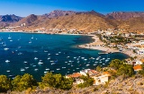 Panoramic view of La Azohía beach (Murcia, Spain), a great spot for boating and practicing water sports of all kinds with the little ones Panoramic view of La Azohía beach (Murcia, Spain), a great spot for boating and practicing water sports of all kinds with the little ones