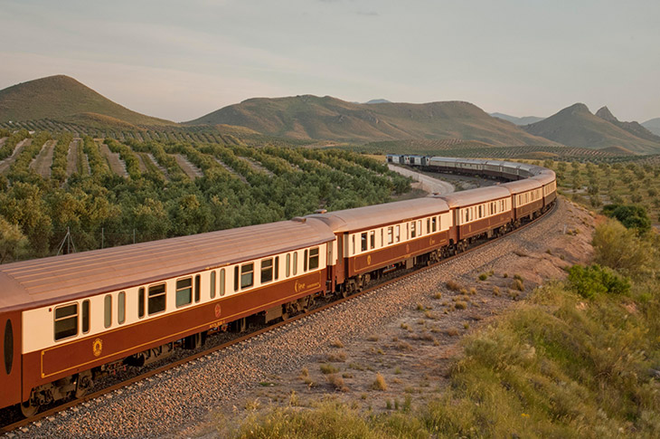 Al Ándalus is currently the longest train running in Spain, offering passengers the choice of two types of accommodation: the Deluxe Suite or Gran Clase Cabin. In the image, the train passes through Linares (Jaén) Al Ándalus is currently the longest train running in Spain, offering passengers the choice of two types of accommodation: the Deluxe Suite or Gran Clase Cabin. In the image, the train passes through Linares (Jaén)