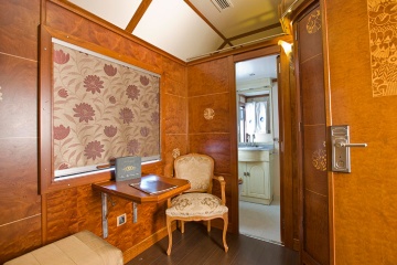 The Deluxe Suite measures 88.9 square feet and offers a private bathroom with hydro-massage shower, welcome toiletries, a wardrobe, a luggage rack, a safe, a minibar, and adjustable climate control