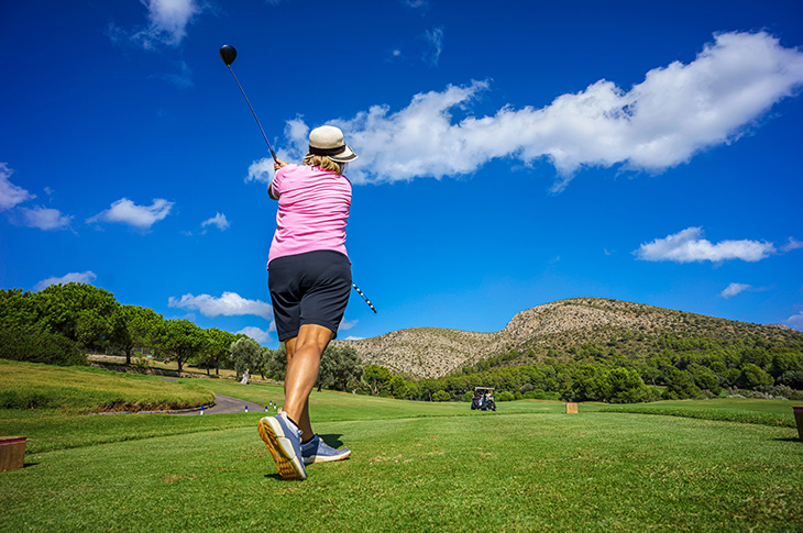 Teeing off at Golf Alcanada course, in the north of the island in Alcudia Bay (Mallorca)