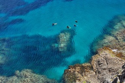 Group of divers in the Cabo de Gata-Níjar Natural Park, in Almeria, known for its rocky formations