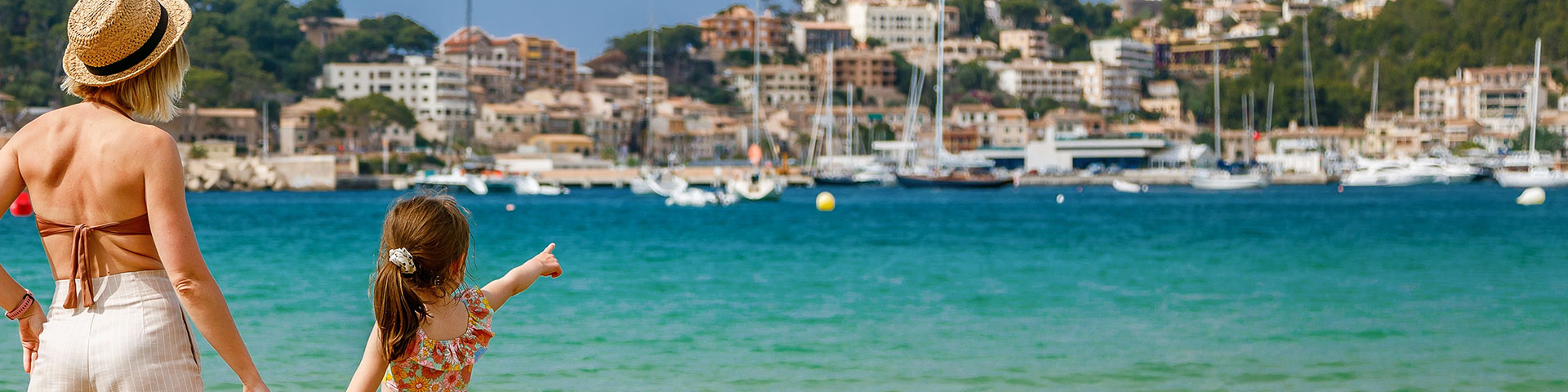 In recent years, the island of Mallorca (Balearic Islands) has strongly committed to family tourism. In the image, mother and daughter admiring the Port de Sóller bay